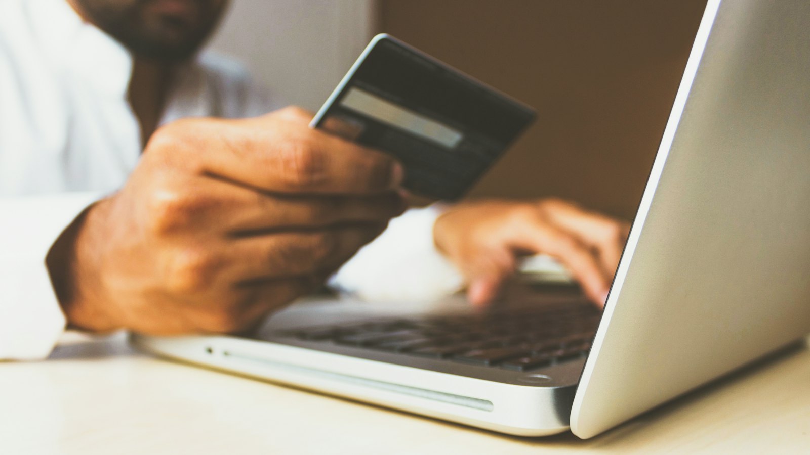 Shopper browsing an online store on a laptop