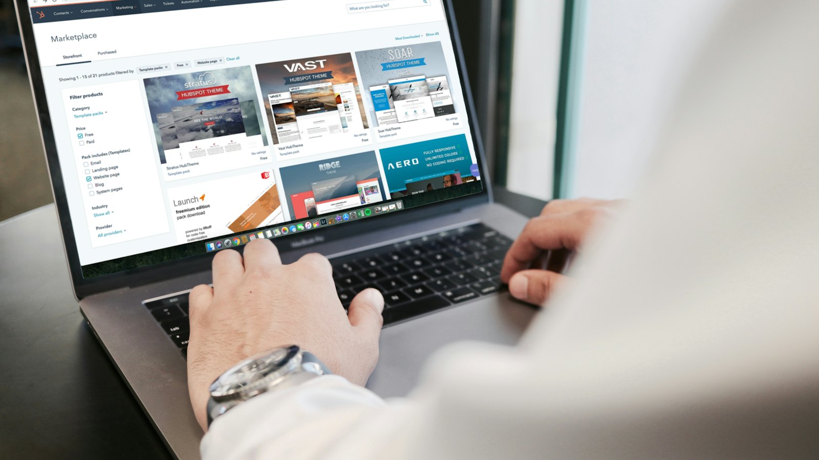 Person browsing a business website on a laptop